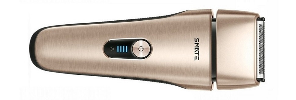 стильная бритва в золотистом корпусе